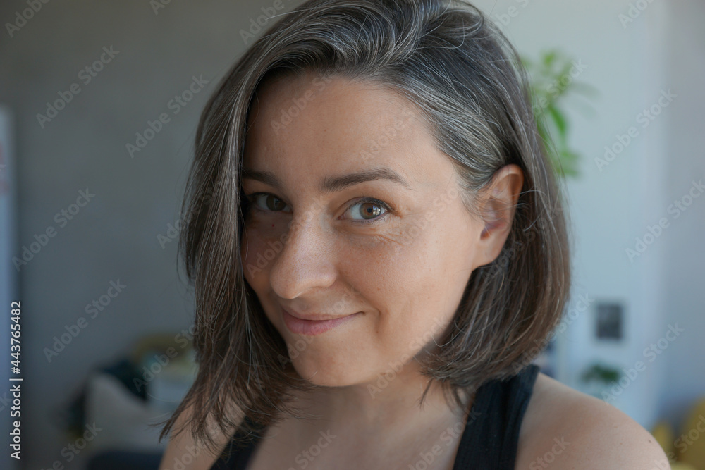 Portrait of a 39 years old woman with gray hair Portrait of a 39 years old woman with gray hair