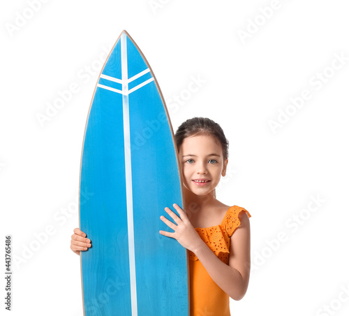 Cute little girl with surfboard on white background © Pixel-Shot
