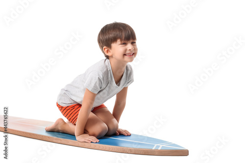 Cute little boy with surfbo...