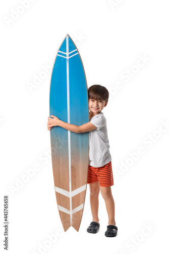 Cute little boy with surfbo...