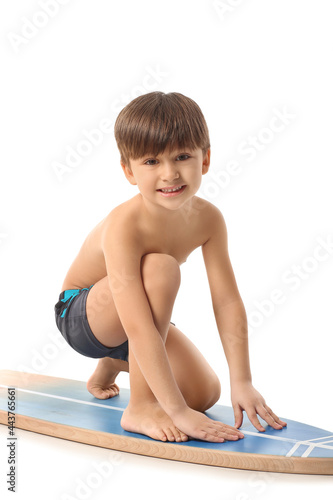 Cute little boy with surfbo...