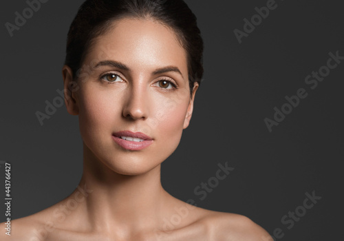 Beautiful brunette woman healthy skin beauty teeth smile natural make up isolated on white © Utkamandarinka
