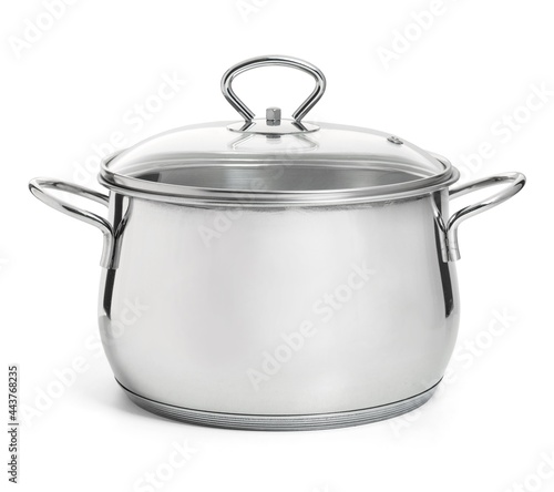 Metal saucepan with glass lid isolated on white background