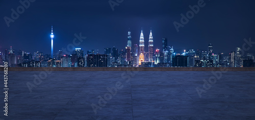 Photography Panoramic view of empty concrete floor of rooftop with city skyline