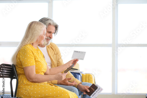 Senior tourists with immune...