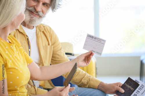 Senior tourists with immune...