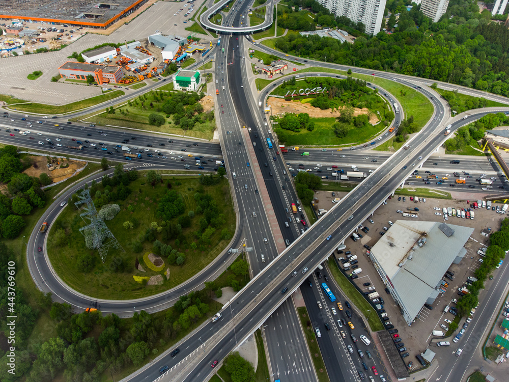 Busy multilevel junction in summer in outskirts Busy multilevel junction in summer in outskirts