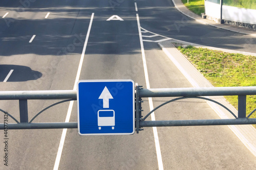 Dedicated lane for bus, public transport. Highway and road sign. photo