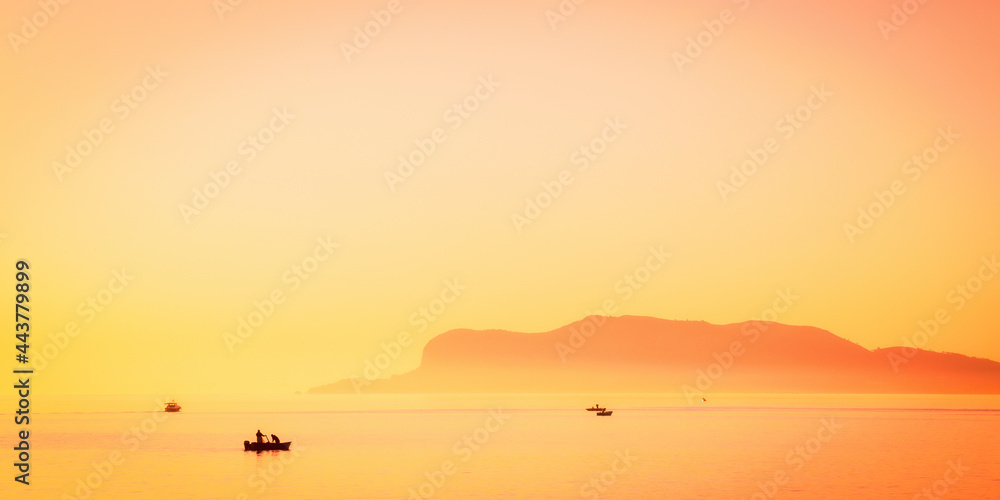 Sunrise at the Coast of Sicily in Italy, Europe Sunrise at the Coast of Sicily in Italy, Europe