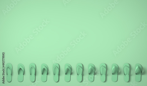 Flip flops on pastel green background. Summer concept. Copy space. Banner. 
