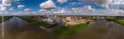 180 degrees aerial panoramic view on recreational port and Kade Zuid construction site of the new Noorderhaven neighbourhood along the river IJssel in Zutphen, The Netherlands © Maarten Zeehandelaar