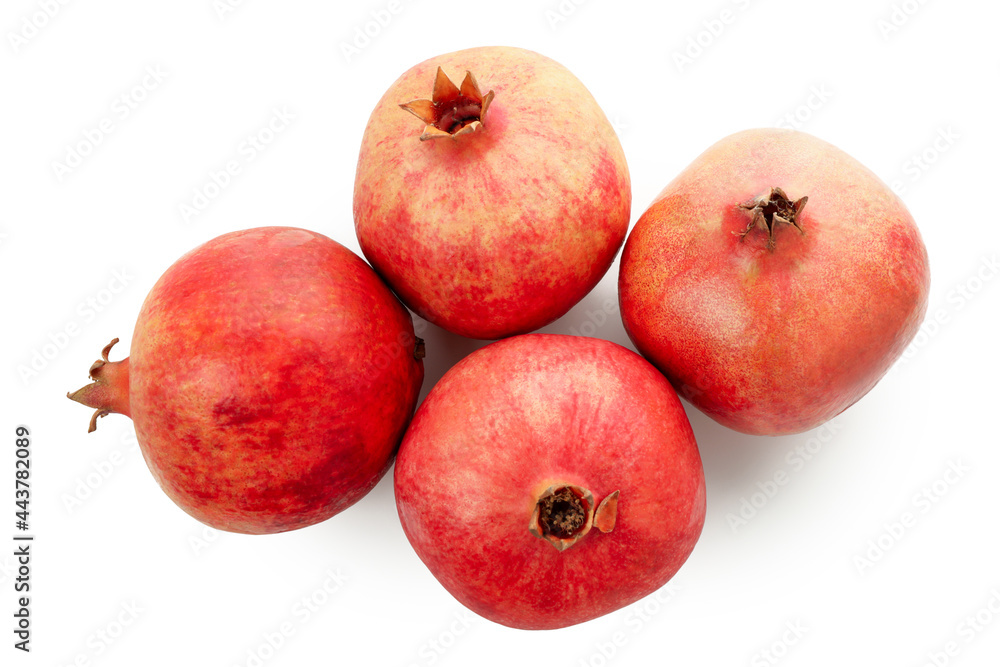 Ripe pomegranate fruits isolated on white background Ripe pomegranate fruits isolated on white background
