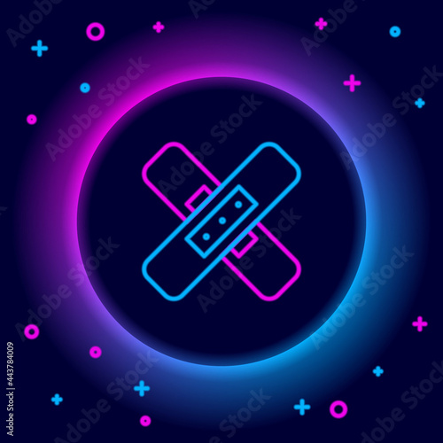 Glowing neon line Crossed bandage plaster icon isolated on black background. Medical plaster, adhesive bandage, flexible fabric bandage. Colorful outline concept. Vector