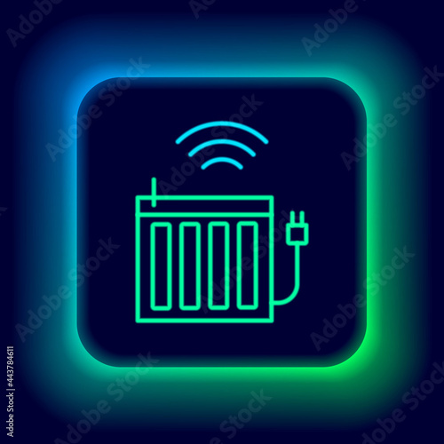 Glowing neon line Smart heating radiator system icon isolated on black background. Internet of things concept with wireless connection. Colorful outline concept. Vector