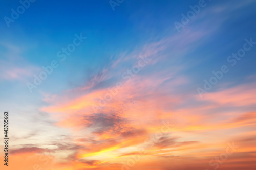 Blur pastels gradient sunset background on soft nature sunrise peaceful morning beach outdoor. heavenly mind view at a resort deck touching sunshine, sky summer clouds. © apichart