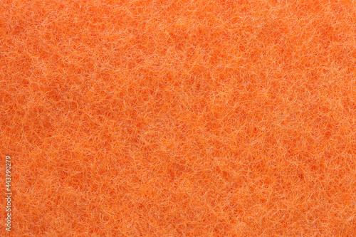 Background of orange scotch brite closeup.  photo