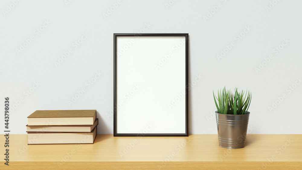 Blank picture with black frame on light wooden surface with books and plant. 3D Rendering Blank picture with black frame on light wooden surface with books and plant. 3D Rendering