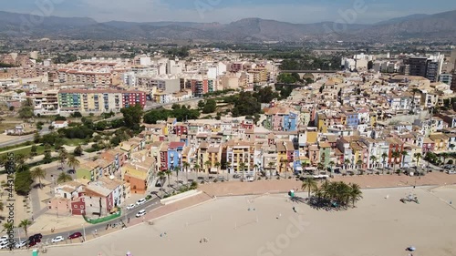 Vistas Aéreas de la Playa de Villajoyosa o La Vila Joiosa de Alicante en España, con sus vistosas fachadas tradicionales de vivos colores. photo