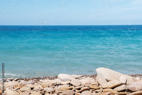 Rocky long beach of mediterranean tyrrhenian sea in Piombino, Toscana, Italy.