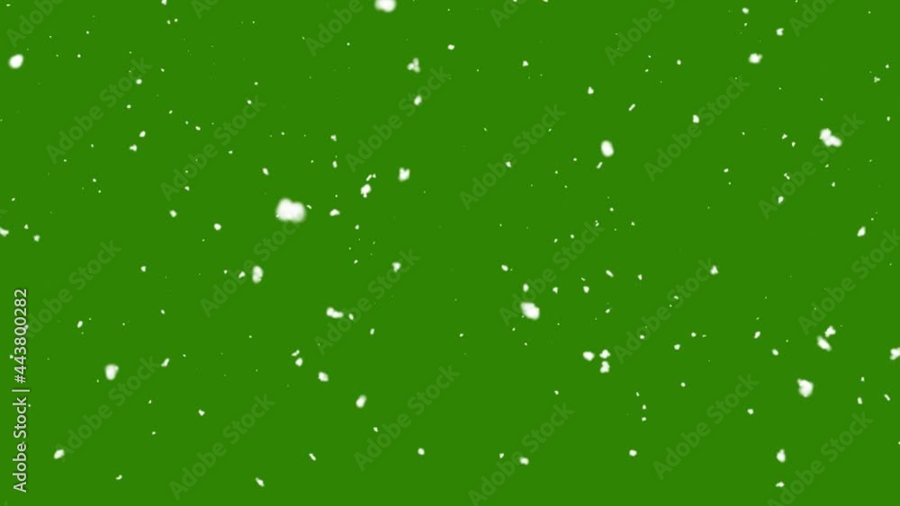 Snow falling on green background Snow falling on green background