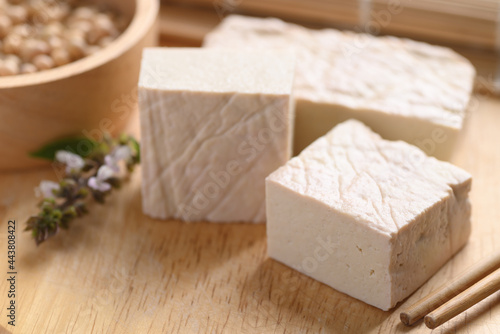Fresh Tofu on wooden cutting board, Food ingredient in Asian cuisine