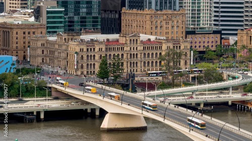 Timelapse of Brisbane Treasury Building and Bridge during the Dayrime photo