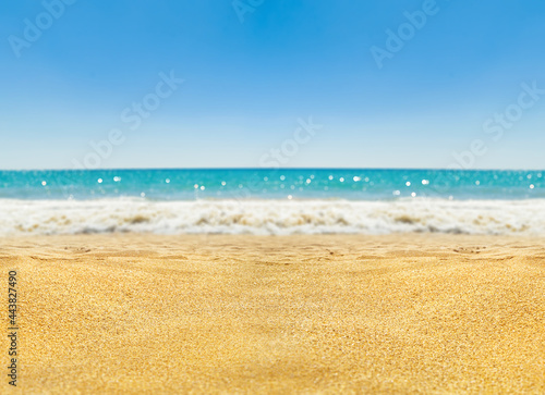 Fototapeta Naklejka Na Ścianę i Meble -   Empty sand beach in front of summer sea with copy space