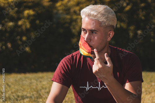 Obraz na plátně a gay boy taking off his rainbow mask.
LGTBI.
Gay pride