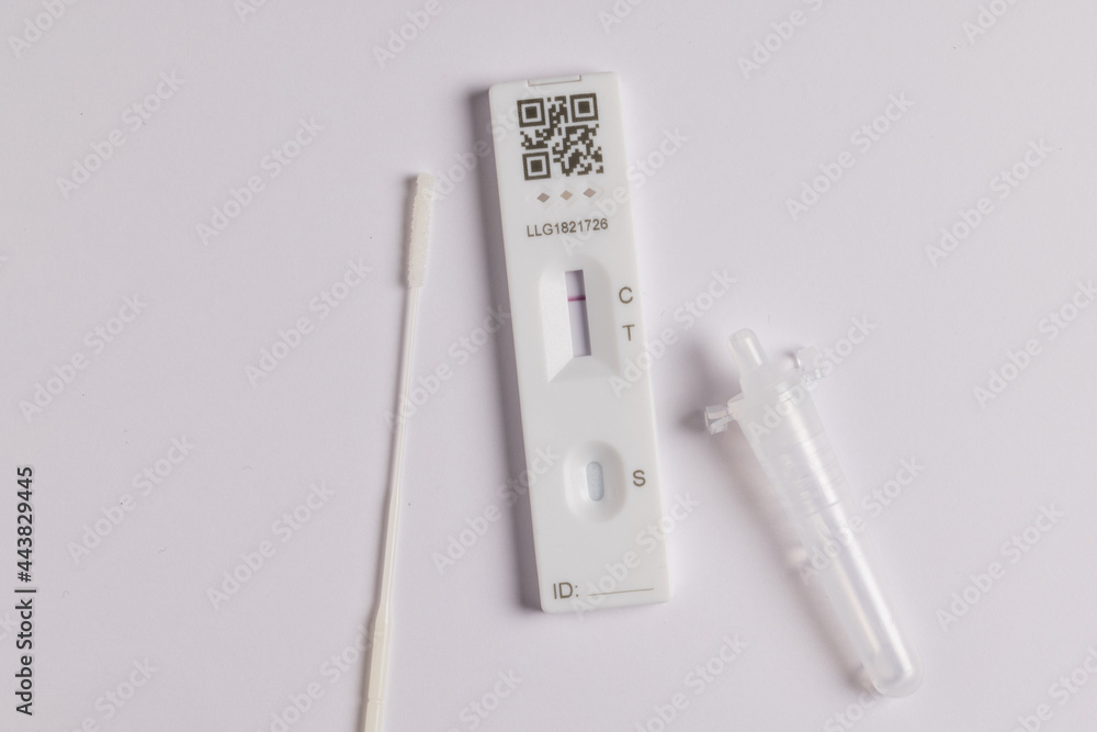 Coronavirus lateral flow self test kit on white background showing negative result - obrazy, fototapety, plakaty 