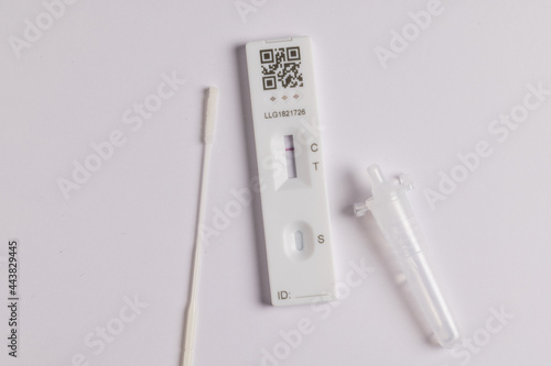 Coronavirus lateral flow self test kit on white background showing negative result photo