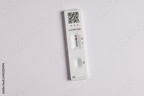 Coronavirus lateral flow self test kit on white background showing negative result