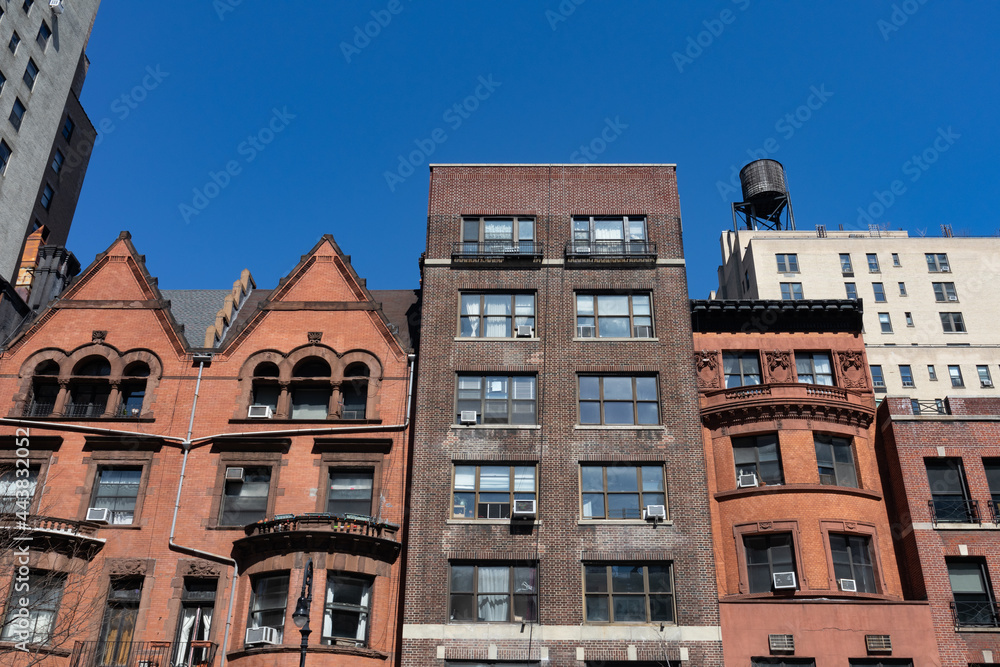 Row of Colorful Old Brownstone Homes and Residential Buildings on the Upper West Side of New York City