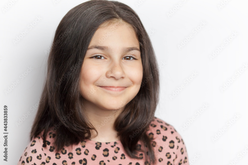 Portrait of a happy laughing kid girl on white background Portrait of a happy laughing kid girl on white background