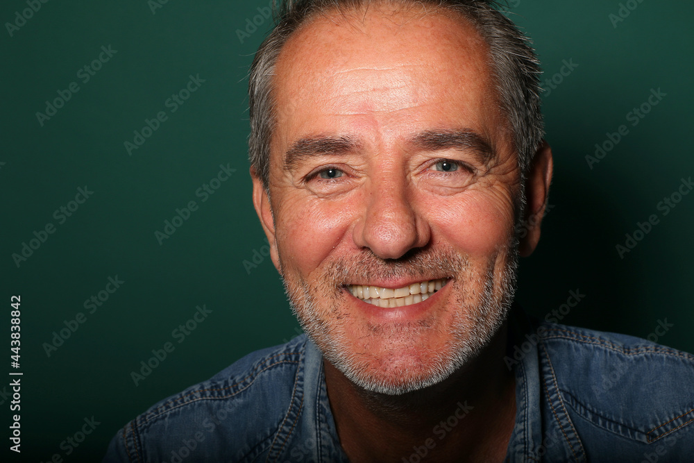 Portrait of a beautiful happy man with facial expressions Portrait of a beautiful happy man with facial expressions