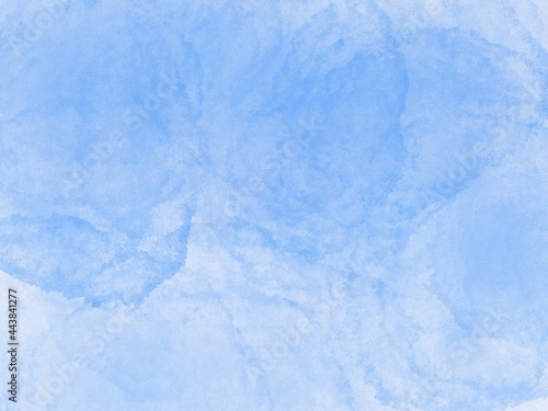 bright blue watercolor paint on white paper texture background