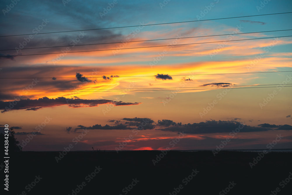 sunset over the sea. Incredibly beautiful sunset with a yellow-blue sky. Beautiful sky at sunset. Wonderful sunset by the ocean. The sea with a beautiful sky. Twilight at sea. Ocean. Sea sunset over the sea. Incredibly beautiful sunset with a yellow-blue sky. Beautiful sky at sunset. Wonderful sunset by the ocean. The sea with a beautiful sky. Twilight at sea. Ocean. Sea