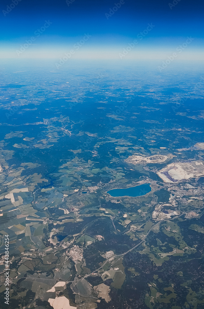 Aerial view of the lake.
Aerial view of lake and land landscape landscape, close-up side view.