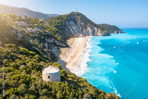 The impressive Milos beach with the turquoise shaded sea on the island of Lefkada, Ionian Sea, Greece photo