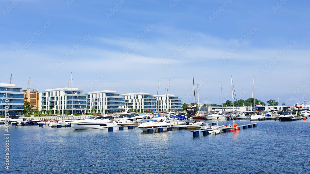 Gdynia, Poland - July 4, 2021: Motorboats and boats in a new modern marina in Gdynia, Poland.