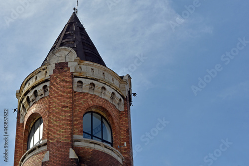 The Gardoš Tower, also known as Millennium Tower or Kula Sibinjanin Janka is a memorial tower located in Zemun, city of Belgrade, Serbia. Daytime shot with clear blue sky with scattered clouds. photo