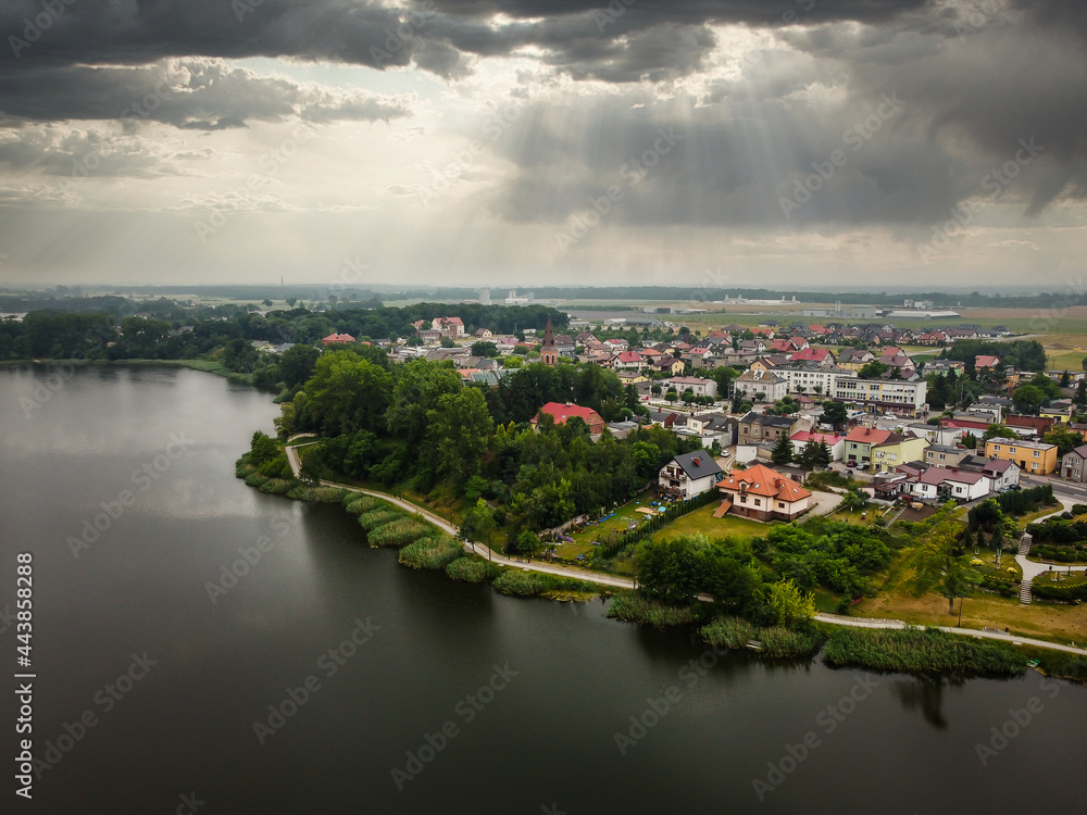 Flight over the lake and view of the city. 