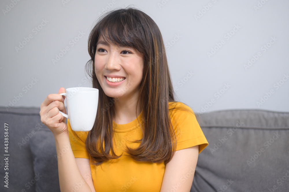 Portrait of young beautiful woman having a cup of coffee Portrait of young beautiful woman having a cup of coffee