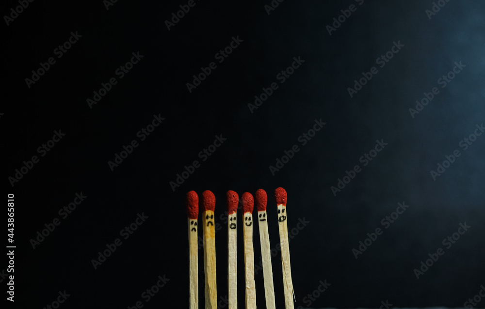 Group of a red match burning isolated with the background. Row burning matchstick in the chain reaction. Matchstick art photography. Group of a red match burning isolated with the background. Row burning matchstick in the chain reaction. Matchstick art photography.