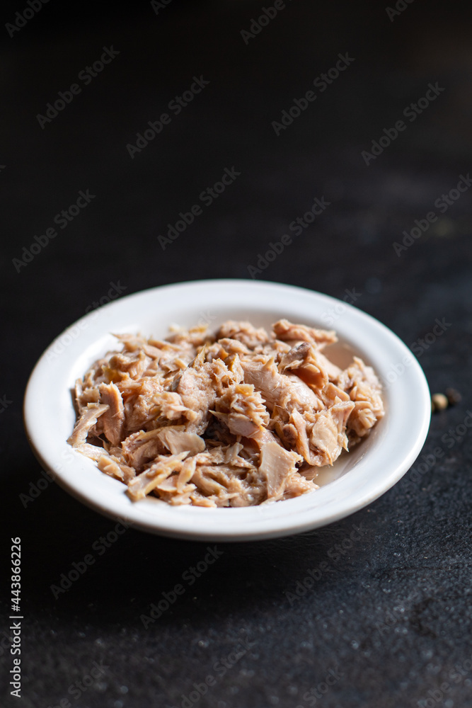 canned tuna fish seafood on the table, healthy food meal snack copy space food background rustic. top view keto or paleo diet vegetarian food pescetarian diet canned tuna fish seafood on the table, healthy food meal snack copy space food background rustic. top view keto or paleo diet vegetarian food pescetarian diet