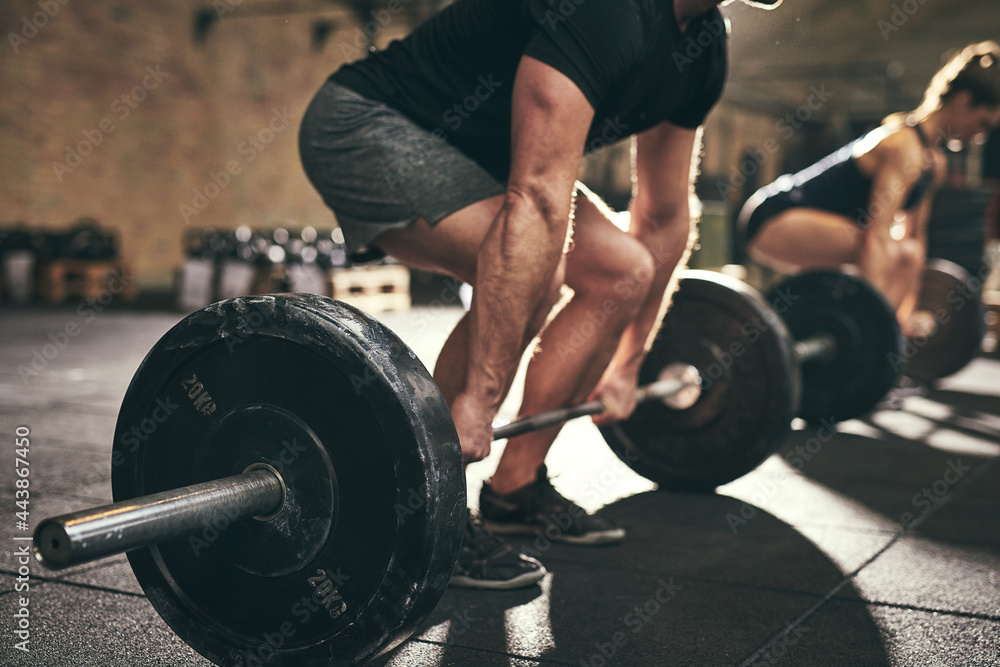 Man lifting weights Man lifting weights