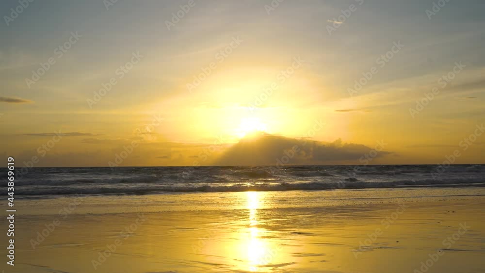 Sun rays of tropical beach seascape horizon. Orange and golden sunset above sea and sky calmness tranquil relaxing sunlight summer mood. Sun rays of tropical beach seascape horizon. Orange and golden sunset above sea and sky calmness tranquil relaxing sunlight summer mood.