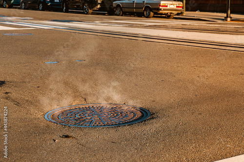 Foto Steam from a manhole on a San Francisco street in the morning