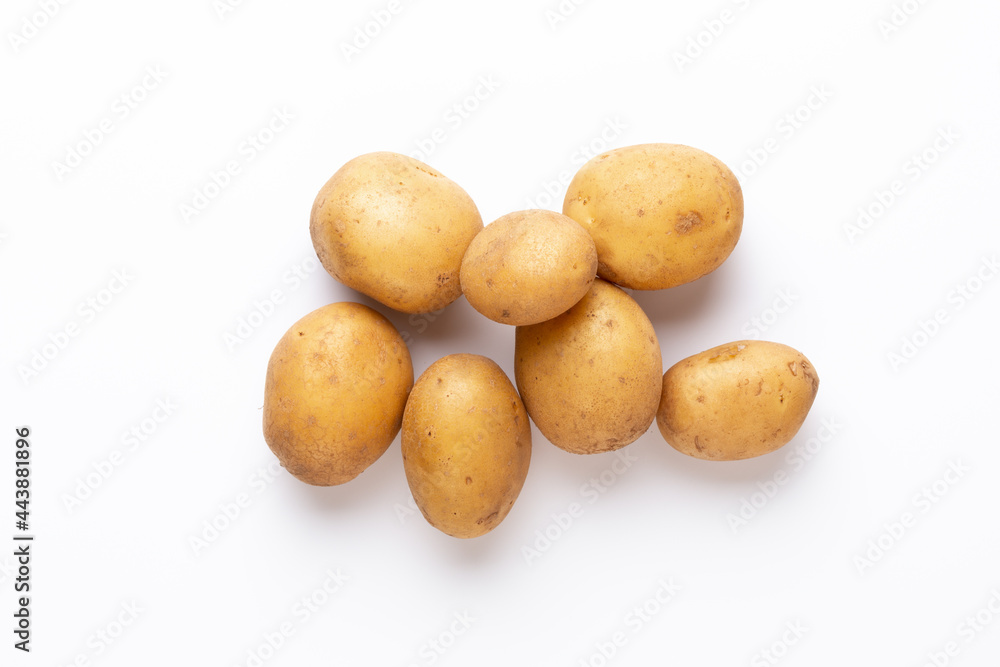 Potatoes isolated on white background. Flat lay. Top view. Potatoes isolated on white background. Flat lay. Top view.
