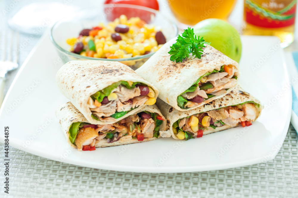 Traditional Mexican Food -  Burrito, on white wooden retro table