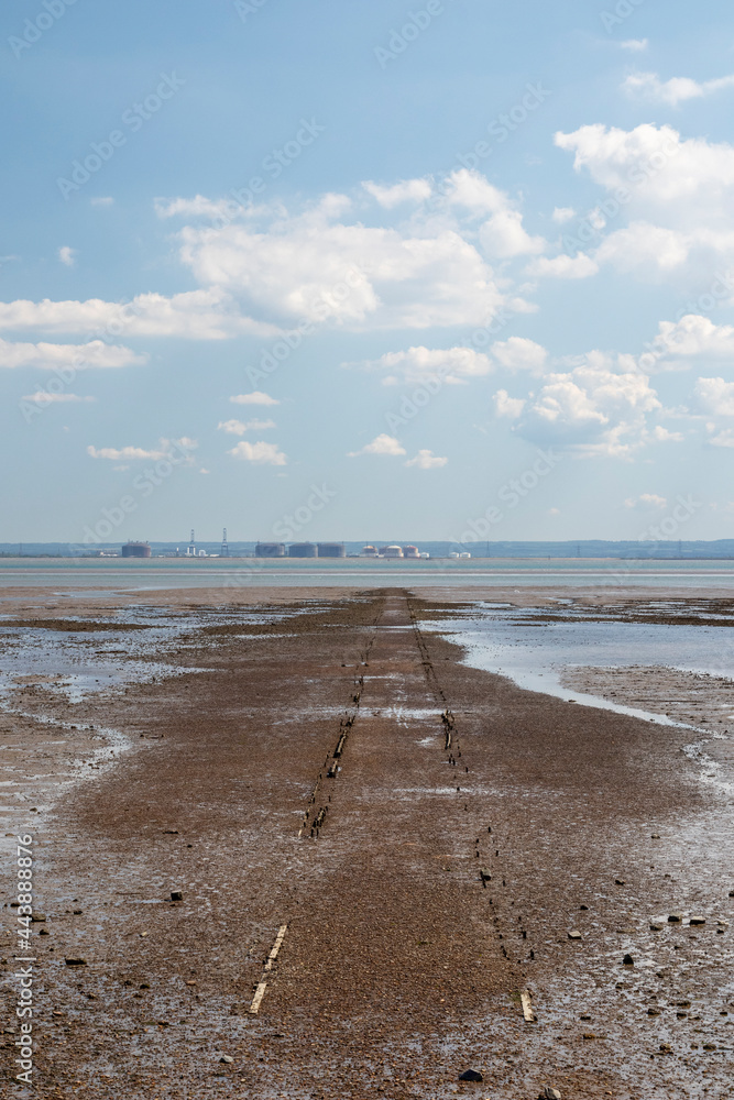 Pathway going out into the sea at Westlcliff, Essex, England, on a summer's day